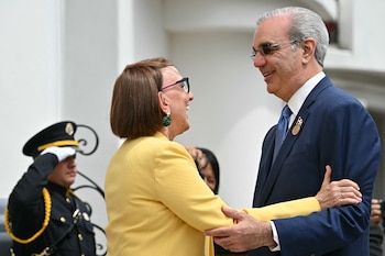 Dominican Republic's President Luis Abinader (R) is received by the Secretary-General of UN Trade and Development (UNCTAD), Costa Rican economist Rebeca Grynspan, at Costa Rica's Art Museum, in San Jose, on May 7, 2026, before a meeting with Costa Rica's president-elect Laura Fernandez. Laura Fernandez will be inaugurated as the new president of Costa Rica on May 8, 2026. (Photo by MARTIN BERNETTI / AFP)