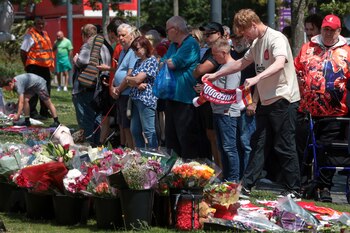 Football fans leave tributes in