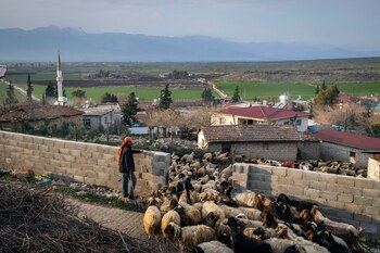 Mehmet Dinler y sus dos