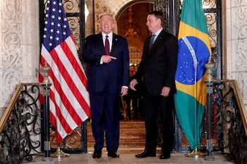 Foto de archivo: El presidente de Estados Unidos Donald Trump participa en una cena con el presidente de Brasil Jair Bolsonaro. (REUTERS/Tom Brenner)