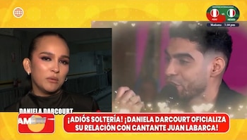 Una captura de pantalla de televisión presenta a Daniela Darcourt a la izquierda y a Juan Labarca con un micrófono a la derecha