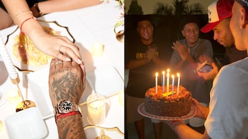 Dos manos sobre una mesa con platos y velas a la izquierda, y un hombre con gorra frente a un pastel con velas encendidas a la derecha