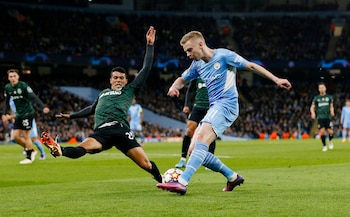 Soccer Football - Champions League - Round of 16 Second Leg - Manchester City v Sporting CP - Etihad Stadium, Manchester, Britain - March 9, 2022 Sporting CP's Pedro Porro in action with Manchester City's Oleksandr Zinchenko REUTERS/Craig Brough