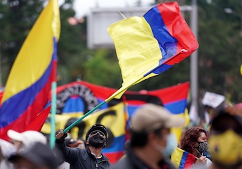 Demonstrators take part in a