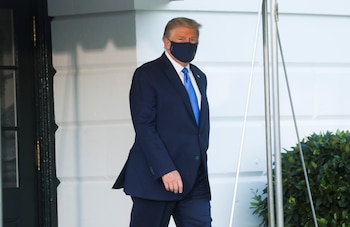 U.S. President Trump walks to