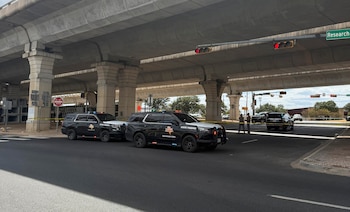 Texas state troopers at the scene where one person is believed to have been shot during a confrontation with Immigration and Customs Enforcement agents in Austin, Texas, on Sunday, Sept. 20, 2026. The shooting in the Texas capital is the latest by federal immigration agents as the Trump administration intensifies its deportation effort. (Lauren McGaughy/The New York Times)
