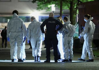 Police members and forensic experts