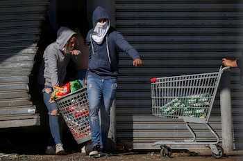 Saqueos en Chile (AFP)