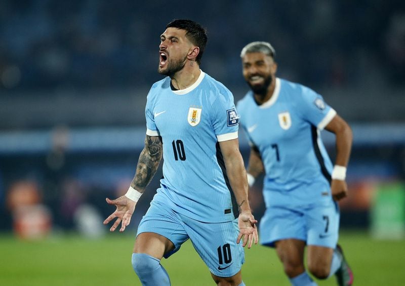 Giorgian de Arrascaeta grita uno de sus 13 goles en los 59 partidos disputados con Uruguay (Crédito: Reuters/Andrés Cuenca)