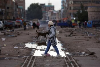 A woman walks along a