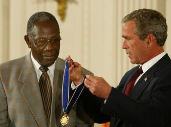 George W. Bush presents Hank