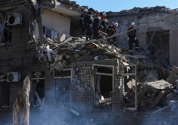 Rescuers work at a site