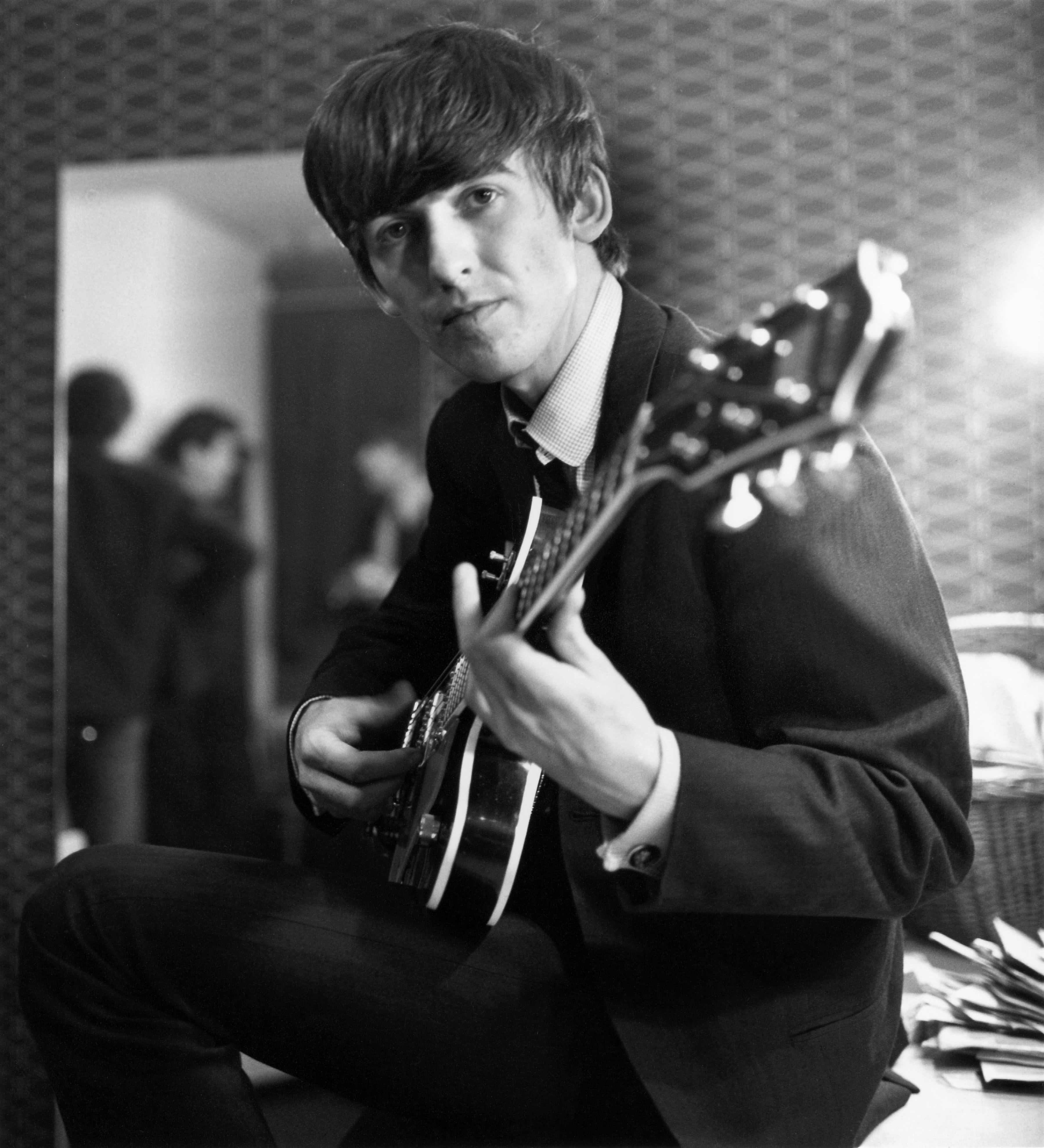 SPECIAL PRICE. The Beatles in the early days: George Harrison in 1963, backstage in London