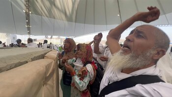 Fieles que participan en la