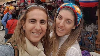 Natalia Málaga junto a su