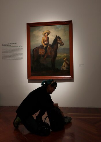 A journalist packs her backpack