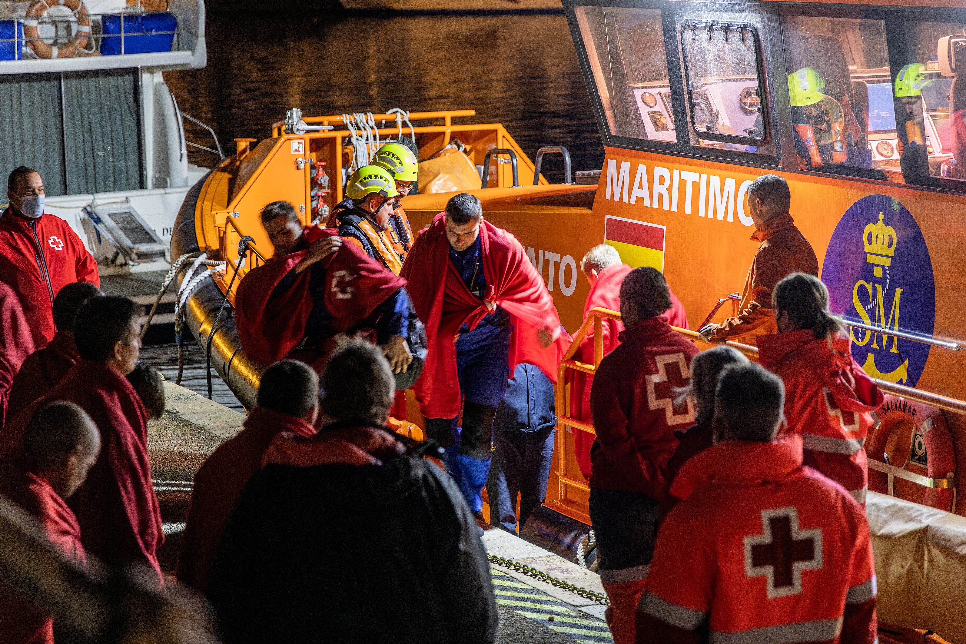 Survivors of the sinking of Russian cargo ship Ursa Major disembark from a Spanish Maritime Rescue ship upon arrival at the port of Cartagena, Spain, December 23, 2024. REUTERS/Jose Maria Rodriguez