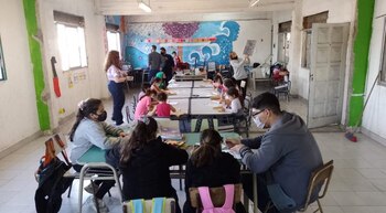 Profesores y profesoras de la