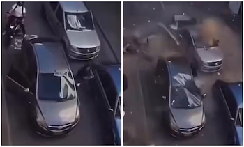 Jhon Ortiz escapó segundos antes de que la fachada de un edificio destruyera por completo su automóvil durante el sismo del 10 de agosto - crédito captura de pantalla