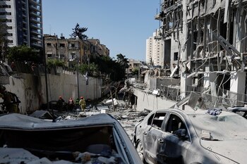 Emergency personnel work at an