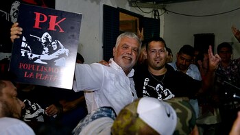 Julio De Vido junto a