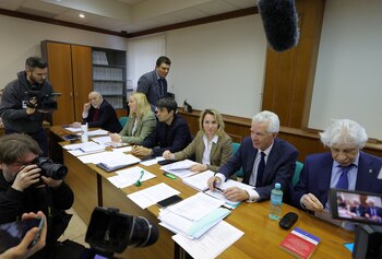 Miembros y abogados del Grupo