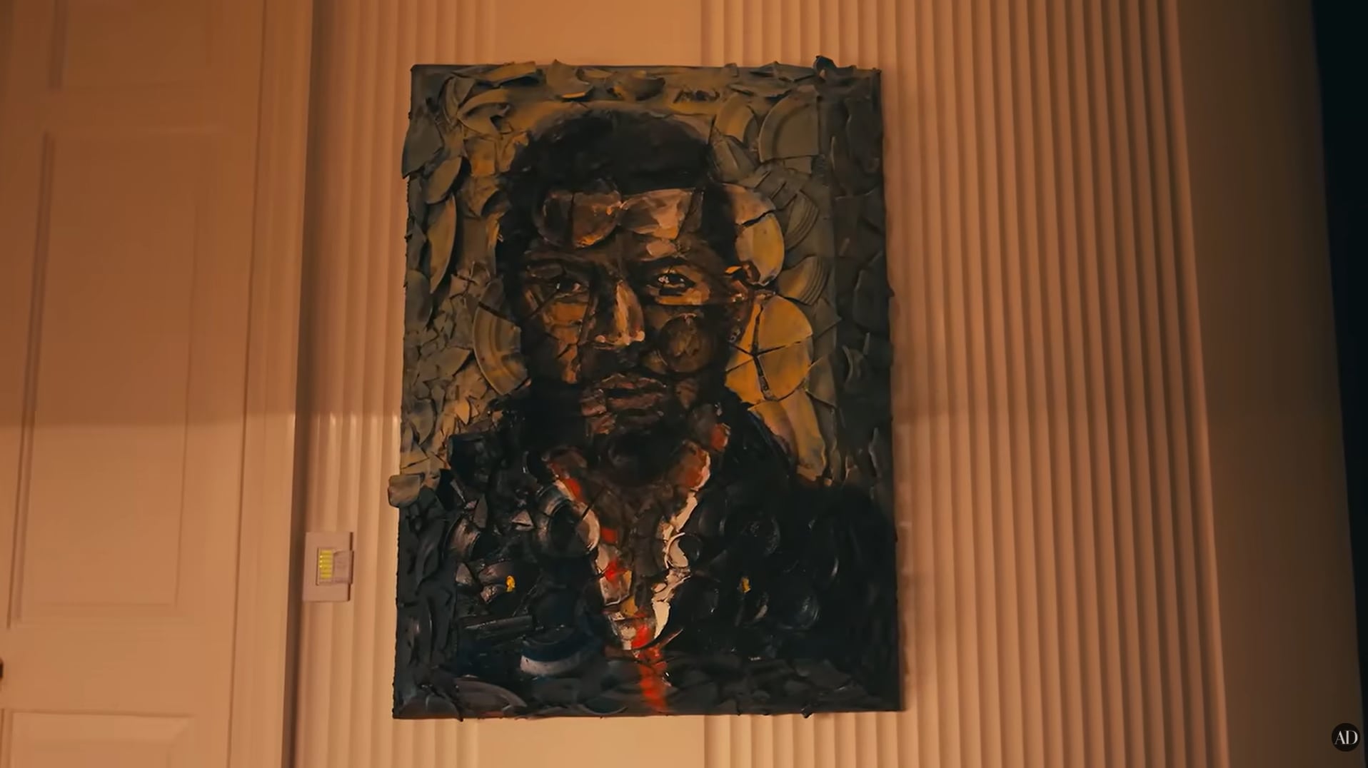 Los retratos de Gordon Parks en la entrada definen la paleta de colores y el tono general de la vivienda. (Architectural Digest)