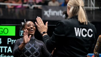10 years later: Biles returns