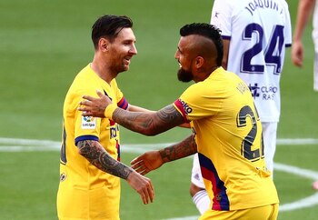 Arturo Vidal y Lionel Messi