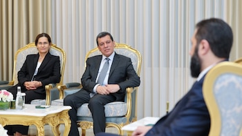 Ahmed al Shara y Mazloum Abdi