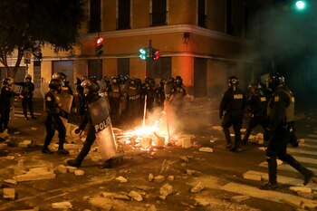 Police officers walk near a
