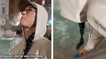 Katy Perry recogiendo su tarjeta de crédito después de tirarla a la Fontana di Trevi