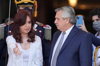 Argentina's Vice President Cristina Fernandez de Kirchner gestures to President Alberto Fernandez outside the National Congress during the opening session of the legislative term for 2022, in Buenos Aires, Argentina March 1, 2022. Natacha Pisarenko/Pool via REUTERS