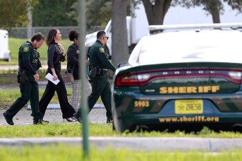 Judge Elizabeth Scherer walks at