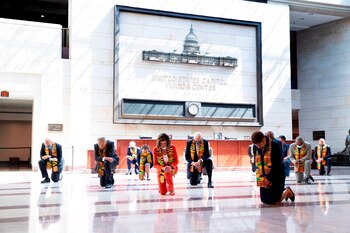 US Speaker of the House Nancy Pelosi (C), Senate Minority Leader Chuck Schumer (2-L) and other Democratic lawmakers kneel while observing a moment of silence to honor George Floyd and victims of racial injustice, on Capitol Hill in Washington, DC, USA, 08 June 2020. EFE/EPA/MICHAEL REYNOLDS