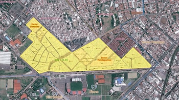 Mapa satelital de un área urbana con calles, edificios y zonas verdes. Se resaltan en amarillo la Villa 1.11.14, Sector Bonorino y Sector Polideportivo.