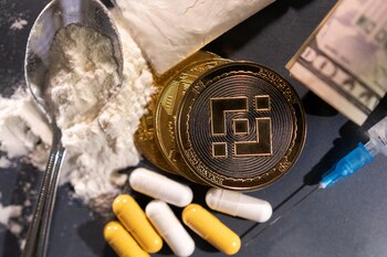 Representations of cryptocurrency exchange Binance and hard drugs are seen in this illustration taken, May 23, 2022. Picture taken May 23, 2022. To match Special Report FINTECH-CRYPTO/BINANCE-DIRTYMONEY REUTERS/Dado Ruvic/Illustration
