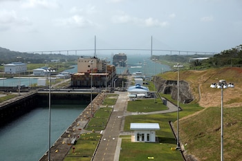 FILE PHOTO: A general view shows cargo container ships transiting through Agua Clara Locks at the Panama Canal, on the outskirts of Panama City, Panama, April 11, 2024. REUTERS/Aris Martinez/File Photo