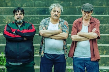 Claudio Rissi flanqueado por Carlos Portaluppi y Alejandro Awada en El Marginal