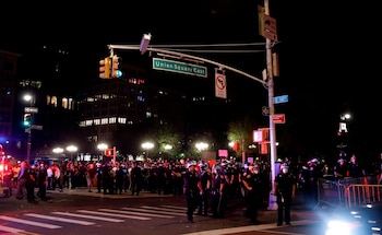 Members of the New York City Police Department are assembled outside of Union Square park during protests over the Minneapolis arrest of George Floyd, who later died in police custody, in New York, USA, 30 May 2020. EFE/EPA/JASON SZENES