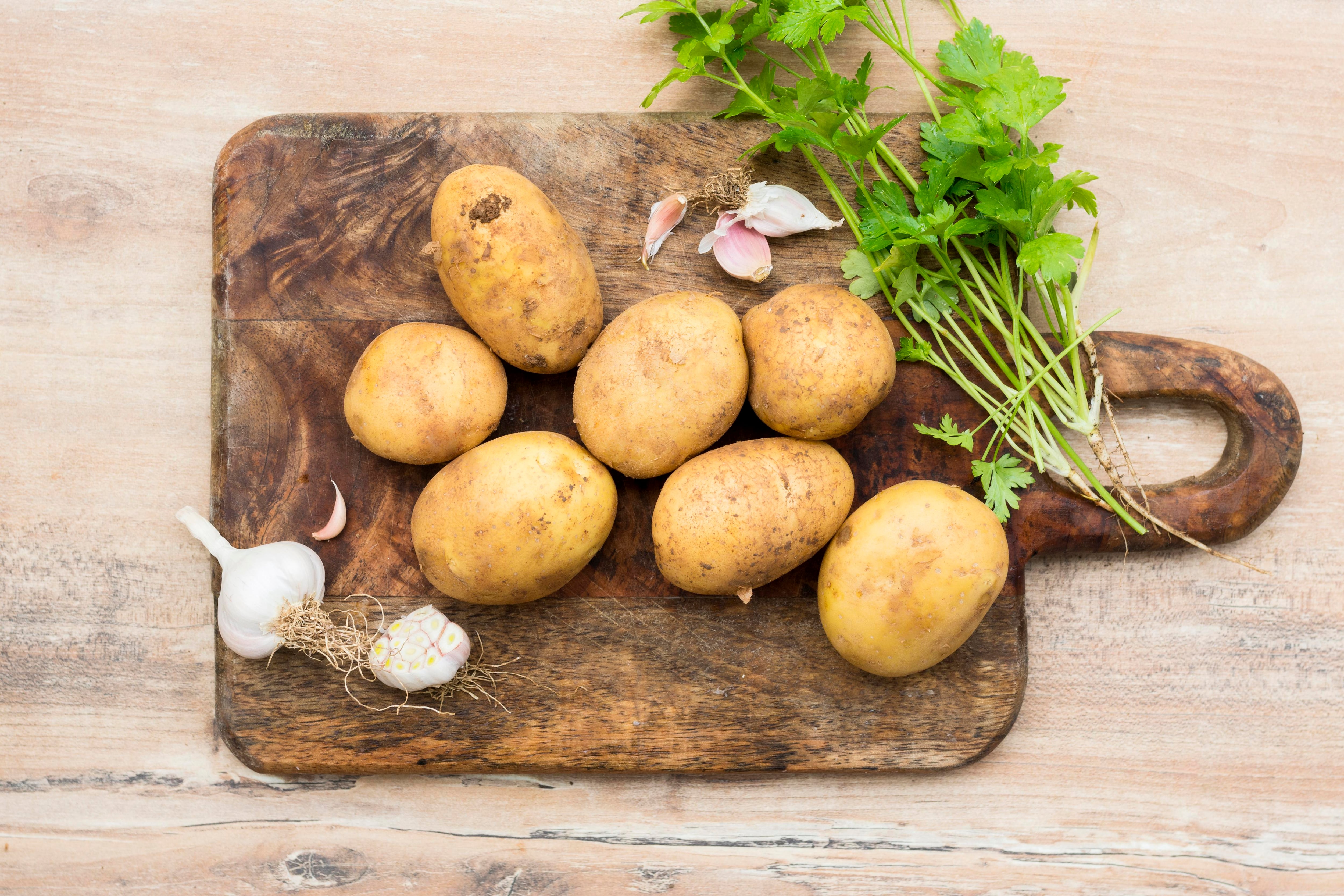 Cómo conservar adecuadamente las patatas en casa (Magnific)