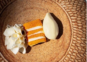 Plato de yuca y mandarina.