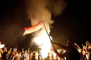 Simpatizantes de la oposición celebran