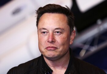 Elon Musk, founder of SpaceX and chief executive officer of Tesla Inc., arrives at the Axel Springer Award ceremony in Berlin, Germany, on Tuesday, Dec. 1, 2020. Tesla Inc. will be added to the S&P 500 Index in one shot on Dec. 21, a move that will ripple through the entire market as money managers adjust their portfolios to make room for shares of the $538 billion company.
