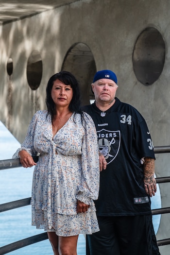 Donna Dubray and Paul Carbullido Jr. near where they rented jet skis, in Long Beach, Calif., Aug. 28, 2026. The two longtime friends who rented jet skis for an hour-long excursion ended fighting for their lives, and Carbullido was stranded at sea for 15 hours. (Ariana Drehsler/The New York Times)