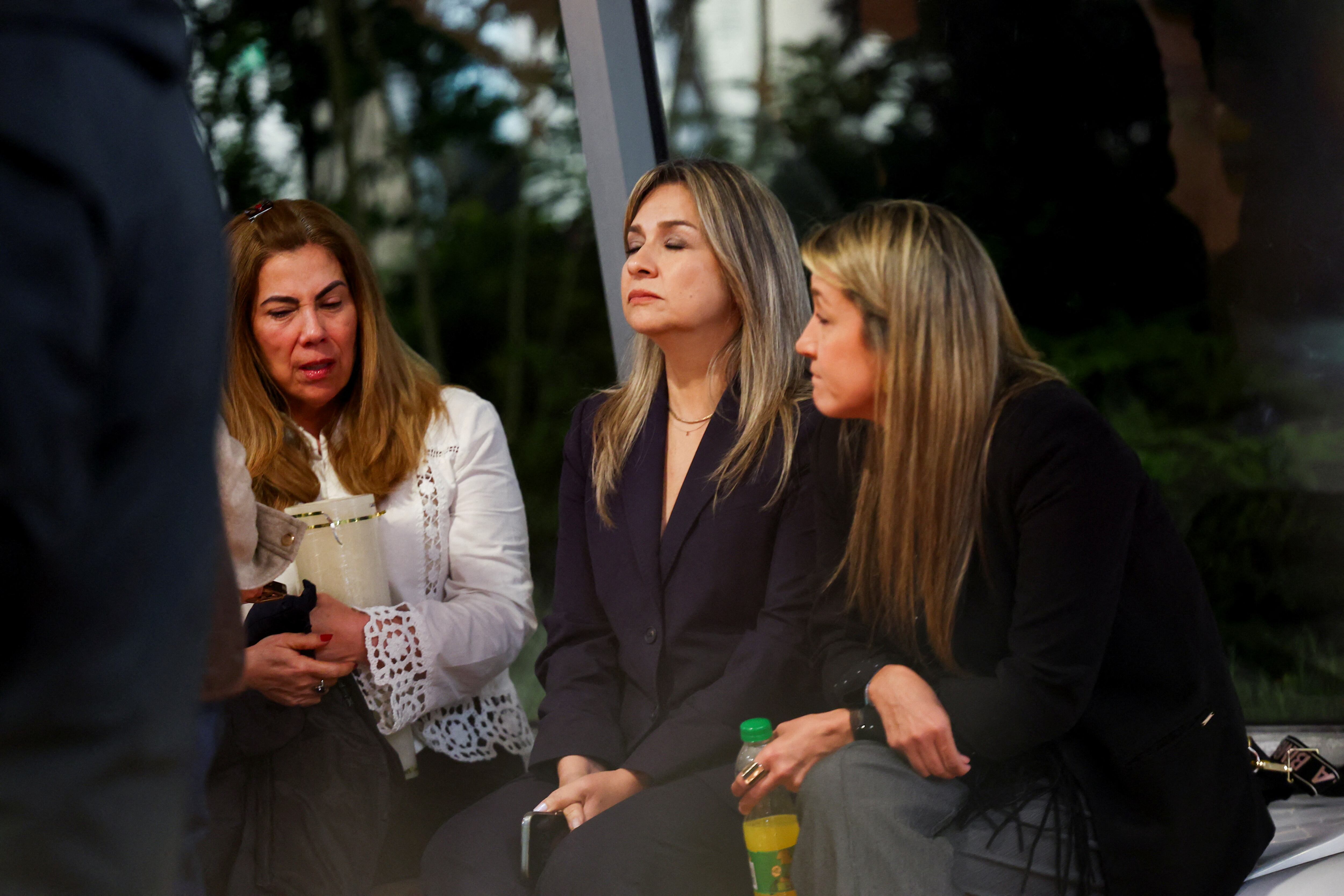 Presidential pre-candidate Vicky Davila sits outside Santa Fe Foundation hospital, where Colombian Senator Miguel Uribe Turbay of the opposition Democratic Center party was shifted from another hospital, after he was shot during a campaign event, in Bogota, Colombia, June 7, 2025. REUTERS/Luisa Gonzalez