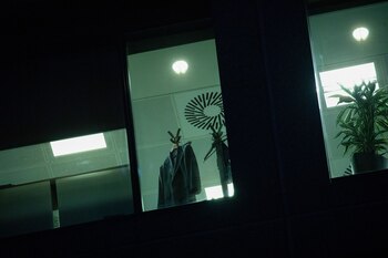 A suit jacket hangs inside