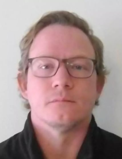 Sean Gardner pasó de dirigir torneos con cientos de atletas a recibir una sentencia que lo mantendrá tras las rejas el resto de su vida (Iowa Department of Corrections)