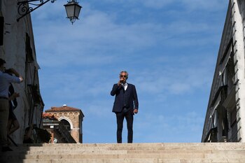 Italian artist Andrea Bocelli sings