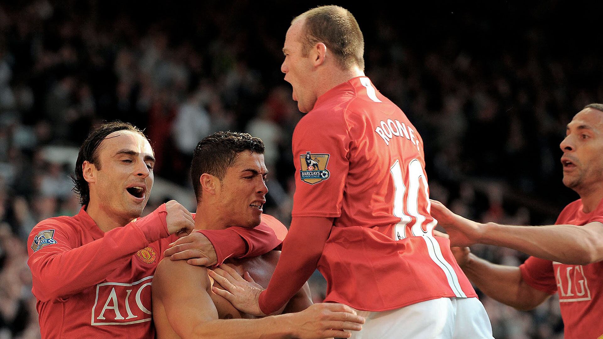 El fichaje de Berbatov por el Manchester United lo llevó a compartir vestuario con figuras como Rooney, Tevez y Cristiano Ronaldo (AFP PHOTO/ANDREW YATES)